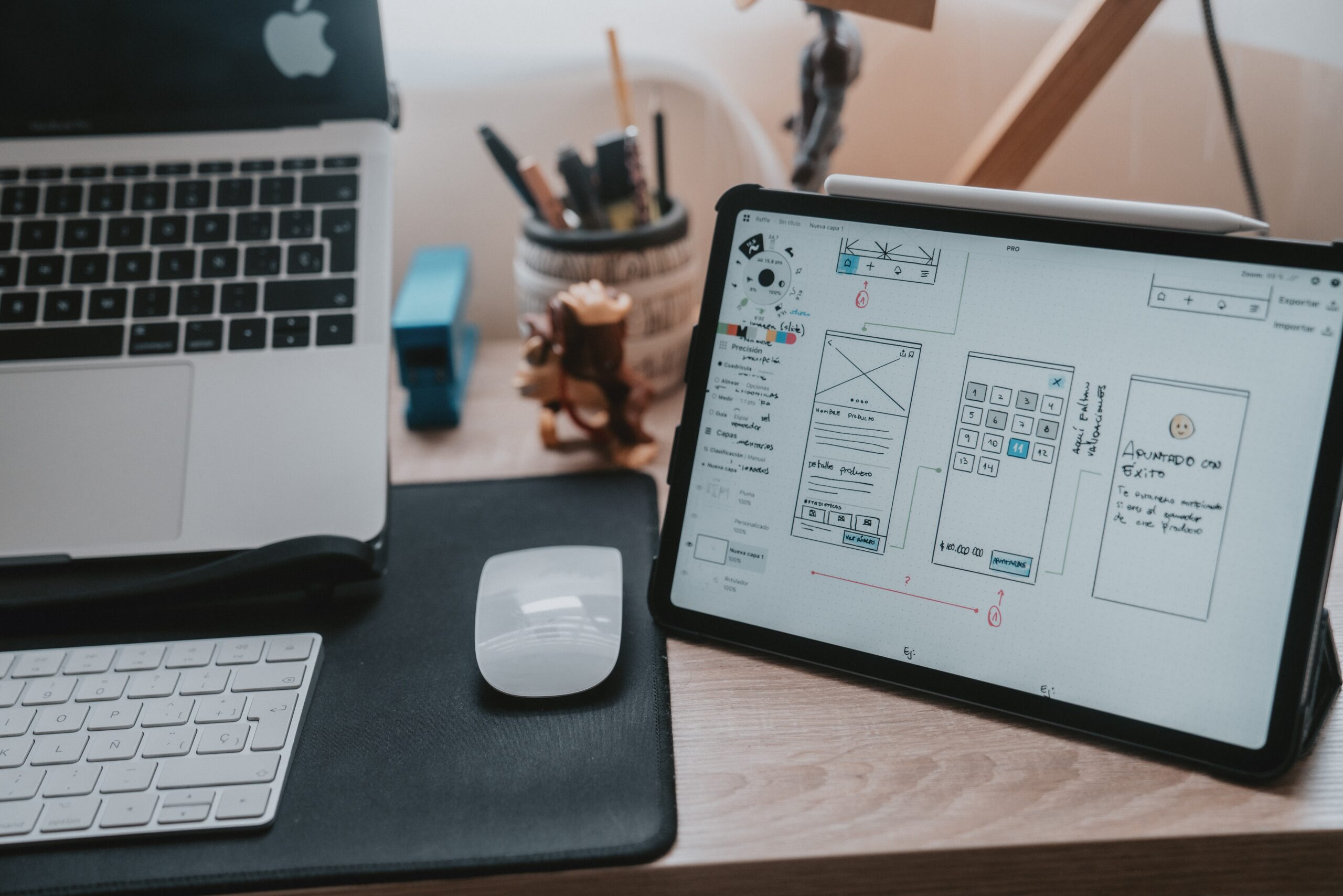 An ipad on a desk next to a keyboard and mouse. Digital marketing services